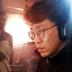 Jae-min “Knee” Bae playing Tekken during his trip to Pakistan